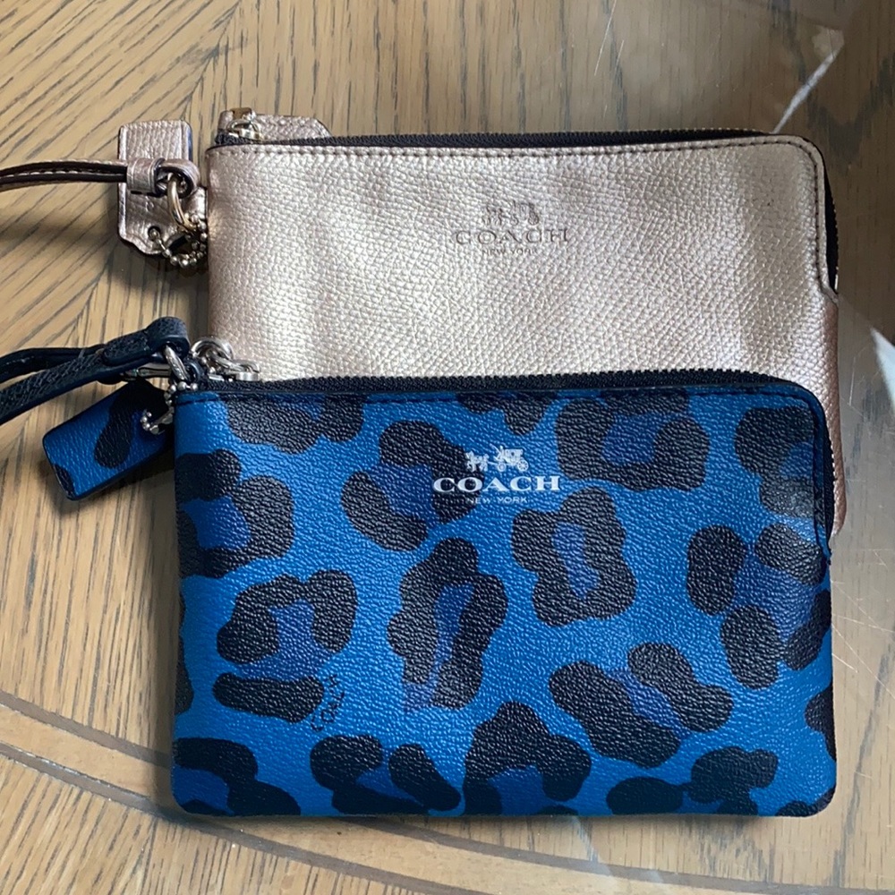 One Coach wristlet